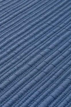 Textura Edredón liso reversible pespuntes