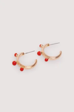 Springfield Pendientes bolitas rojas
